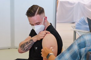 An employee of the BASS company who was vaccinated.